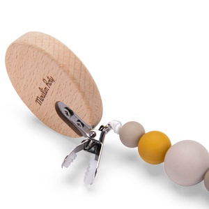 Attache-tétine lion SOUS MON BAOBAB Moulin Roty