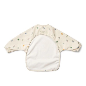 Bavoir manches longues MERLE Liewood Aviator ecru