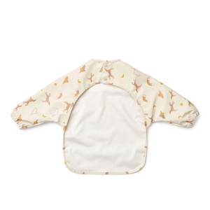Bavoir manches longues MERLE Liewood Dream ecru