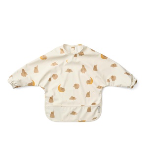 Bavoir manches longues MERLE Liewood Elephant creme de la creme