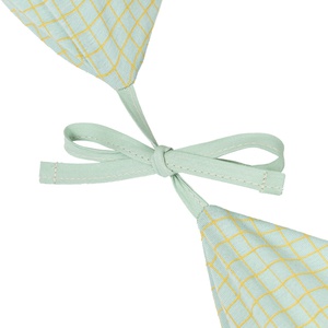 Coussin de maternité STORIES Édition limitée Nobodinoz green lemon grid