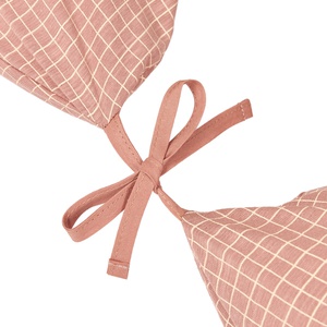 Coussin de maternité STORIES Édition limitée Nobodinoz pink cream grid