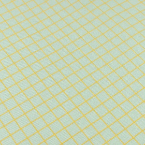 Drap housse 70x140cm STORIES Édition limitée Nobodinoz green lemon grid
