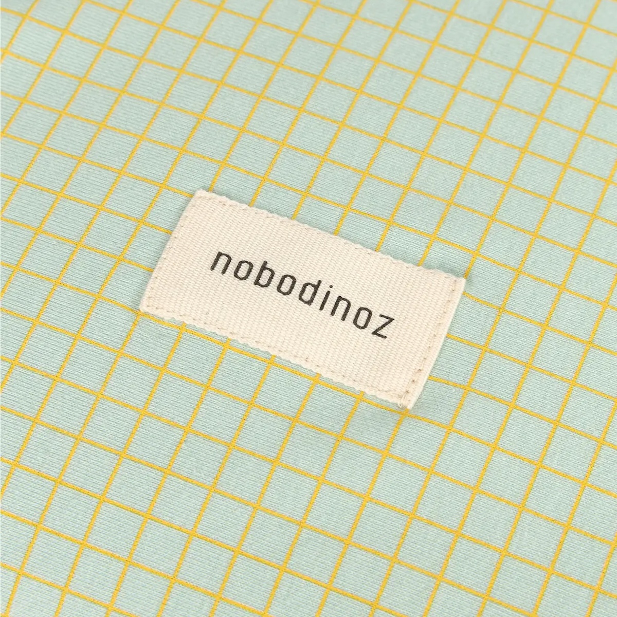 Housse de matelas à langer 50x70cm STORIES Édition limitée Nobodinoz green lemon grid