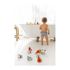 Jouet de bain FLO THE FLOATIE Oli&Carol yellow