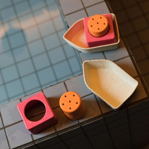 Jouet de bain UPCYCLED BOAT Oli and Carol orange