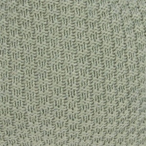 Peluche musicale tricotée Laessig étoile verte