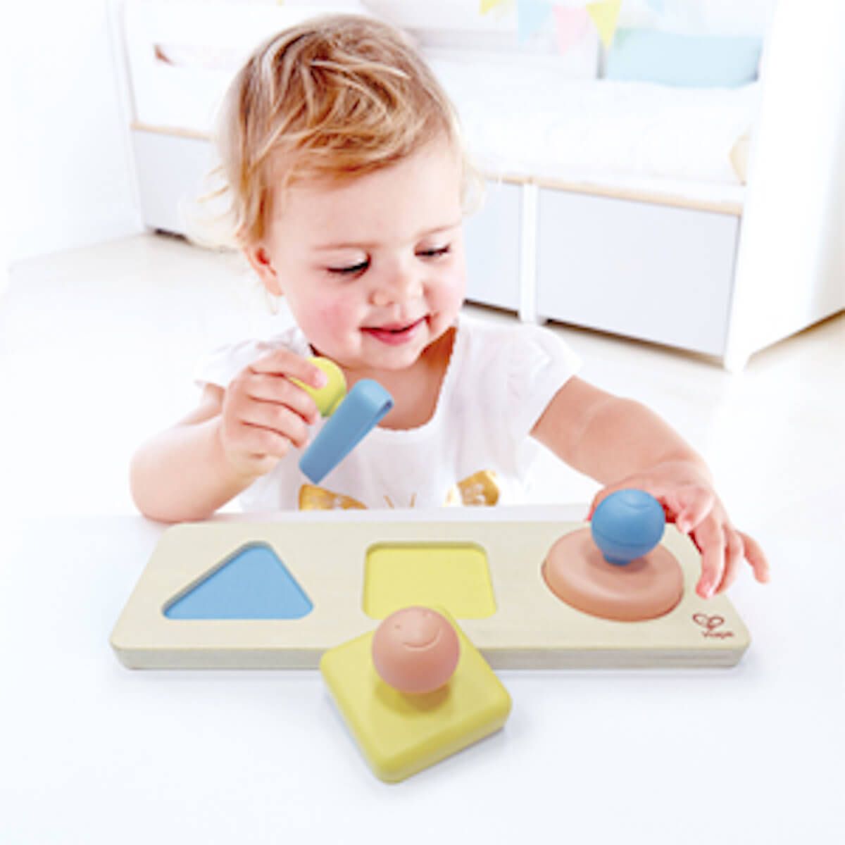 Puzzle trieur de formes Montessori en riz Hape