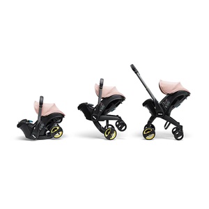 Siège-auto-poussette de bébé à 15 mois Doona blush pink