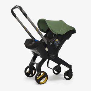 Siège-auto-poussette de bébé à 15 mois Doona i Desert green