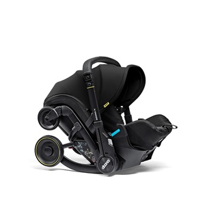 Siège-auto-poussette de bébé à 15 mois Doona X nitro black