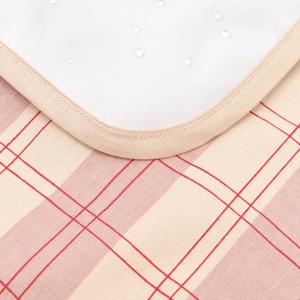 Tapis à langer 45x65cm STORIES Édition limitée Nobodinoz powder red checks