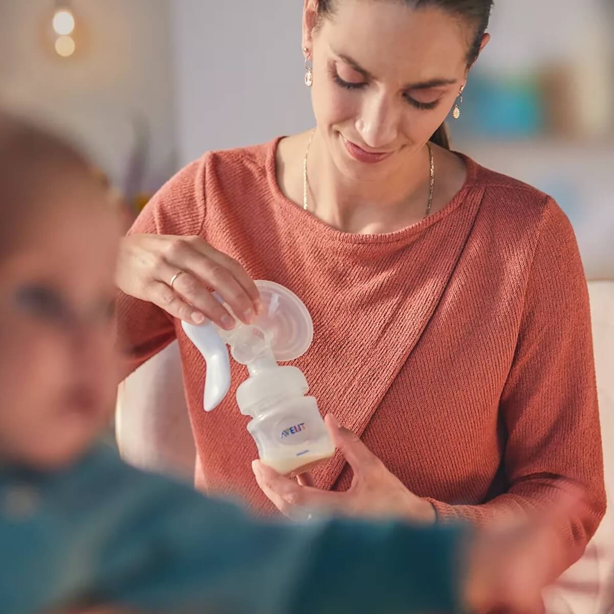 Tire lait manuel avec biberon Avent